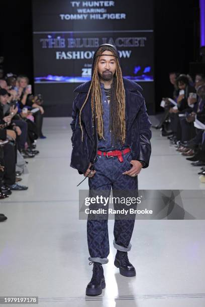 Ty Hunter walks the runway during the 8th Annual Blue Jacket Fashion Show at Moonlight Studios on February 01, 2024 in New York City.