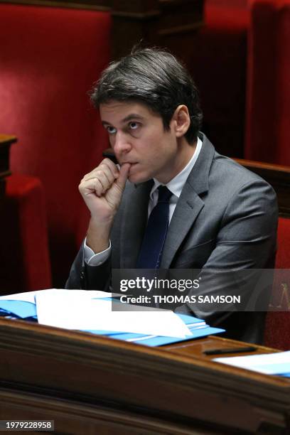 French Prime Minister Gabriel Attal reacts during a session at the National Assembly in Paris, on February 5, 2024. The French Prime Minister and his...