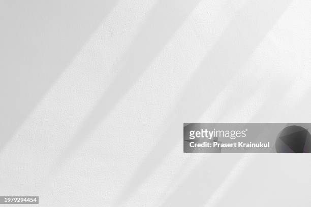 shadow on concrete wall surface for the background - backgrounds stock pictures, royalty-free photos & images