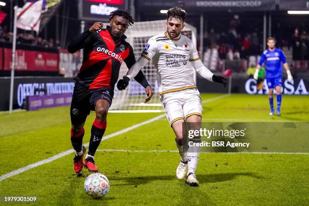 Loic Mbe Soh of Almere City FC battles for possession with Troy Parrott of Excelsior Rotterdam during the Dutch Eredivisie match between Almere City...