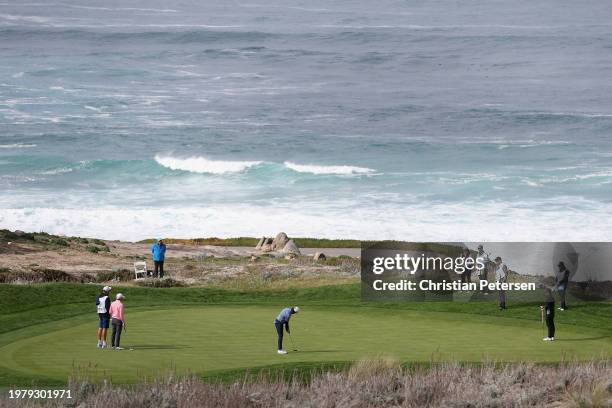 Tommy Fleetwood of England puts on the third green during the first round of the AT&T Pebble Beach Pro-Am at Spyglass Hill Golf Course on February...