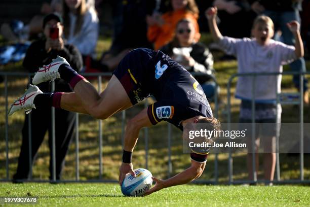 Sam Gilbert of the Highlanders scores a try during the Super Rugby Pacific Pre-Season match between Highlanders and Moana Pasifika at Queenstown...