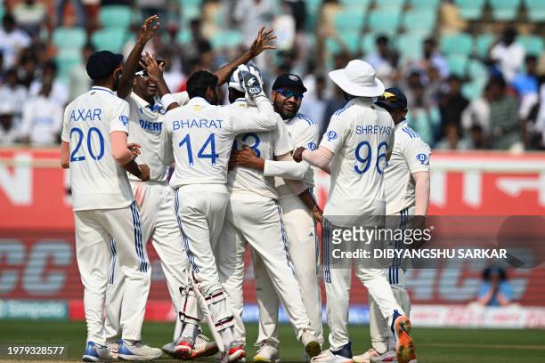 India's Jasprit Bumrah celebrates with teammates after taking the wicket of England's Ben Foakes during the fourth day of the second Test cricket...