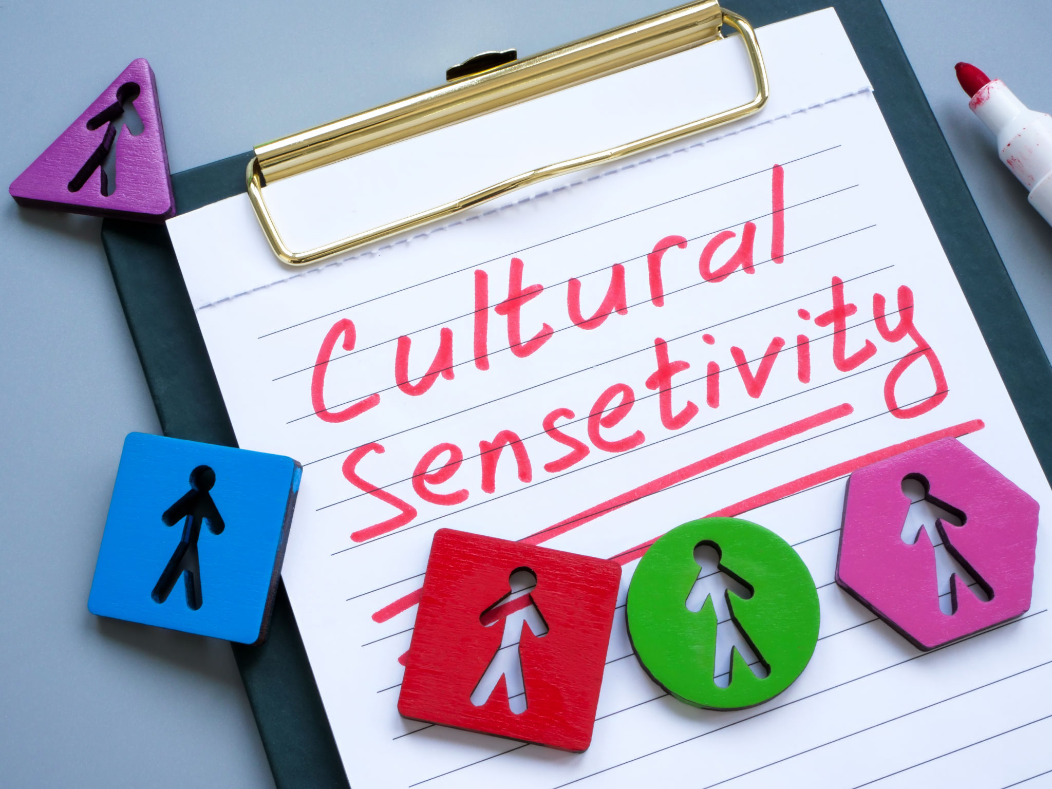 Cultural sensitivity memo and colored figurines. Cultural sensitivity memo and colored figurines.