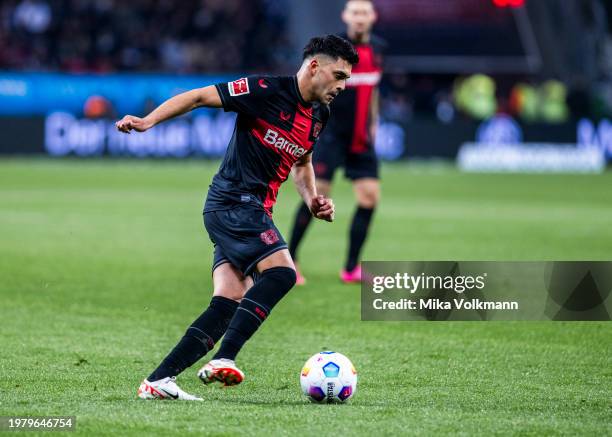 Nadiem Amiri of Leverkusen runs with the ball during the Bundesliga match between Bayer 04 Leverkusen and Borussia Moenchengladbach at BayArena on...