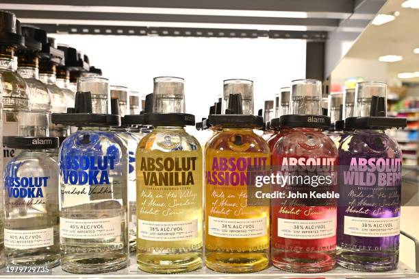 Bottles of Absolut Swedish, Vanilla, Passion Fruit, Raspberry and Wild Berry flavoured Vodka are displayed for sale on January 31, 2024 in Leigh on...