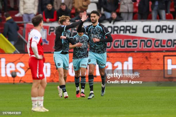 Taylor Booth of FC Utrecht is looking at his brother after he scored the 0-1, Zach Booth of FC Volendam, Benaissa Benamar of FC Volendam during the...