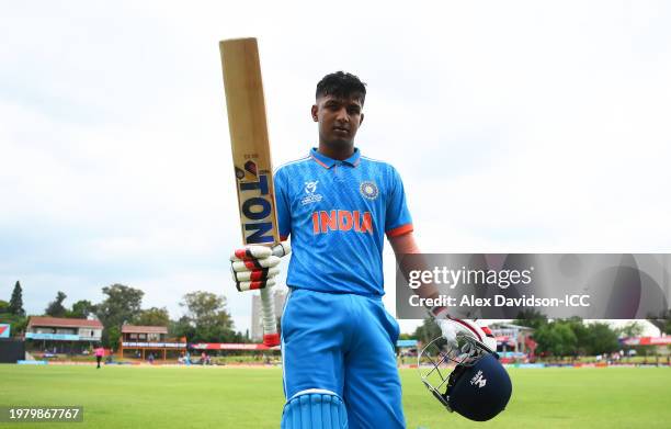 Sachin Dhas of India raises his bat as he leaves the field during the ICC U19 Men's Cricket World Cup South Africa 2024 Super Six match between India...