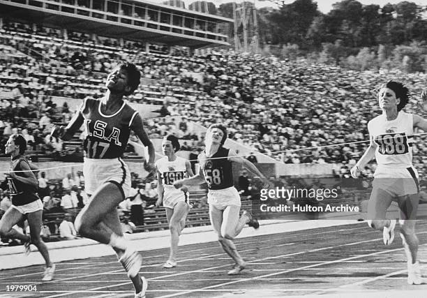 Wilma Rudolph of the USA wins the Gold Medal in the 100 meter sprint on August 3, 1960 during the Summer Olympic Games in Rome, Italy.