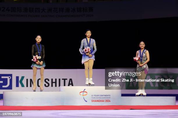 Silver medalist Chaeyeon Kim of South Korea, gold medalist Mone Chiba of Japan and bronze medalist Rinka Watanabe of Japan pose on the podium at the...