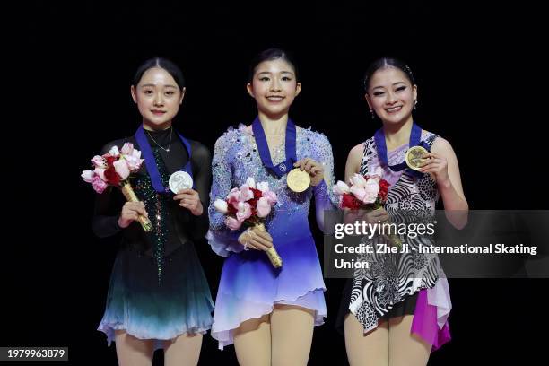 Silver medalist Chaeyeon Kim of South Korea, gold medalist Mone Chiba of Japan and bronze medalist Rinka Watanabe of Japan pose on the podium at the...