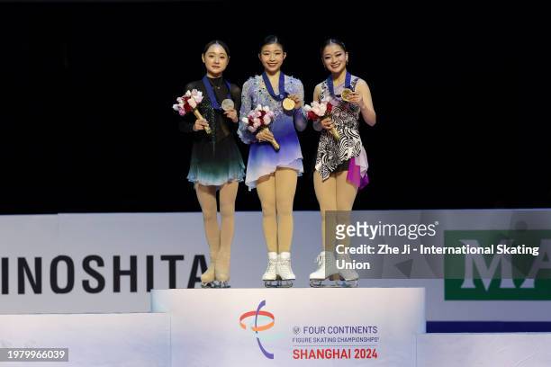 Silver medalist Chaeyeon Kim of South Korea, gold medalist Mone Chiba of Japan and bronze medalist Rinka Watanabe of Japan pose on the podium at the...