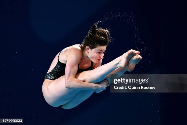 Maddison Keeney of Team Australia competes in the Mixed Team Event Final on day one of the Doha 2024 World Aquatics Championships at Hamad Aquatic...