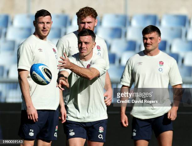 George Ford of England passes the ball during the England Captain's Run ahead of the Guinness Six Nations 2024 match against Italy and England at...