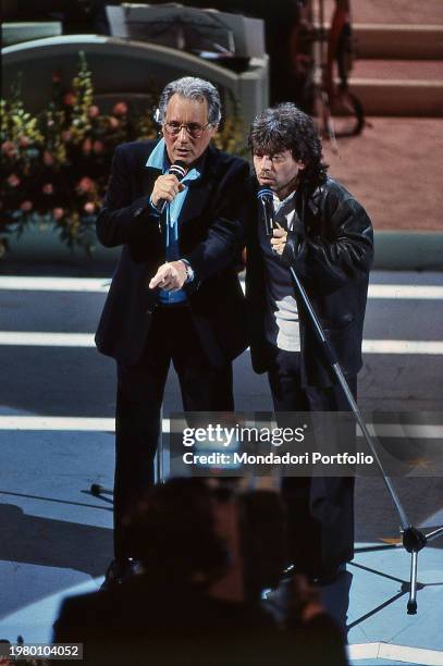 Singer, cabaret artist, pianist, actor, screenwriter Enzo Jannacci and Italian singer Paolo Rossi sing Soliti Racconti during the Italian Song...