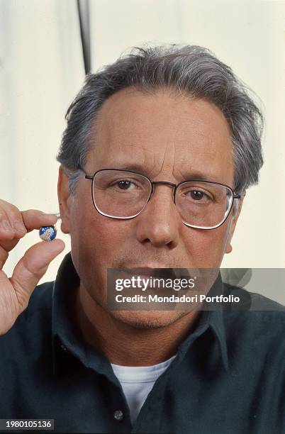 Singer-songwriter, cabaret artist, pianist, actor, screenwriter Enzo Jannacci during a photo shoot for the Italian Song Festival. Sanremo , 1991