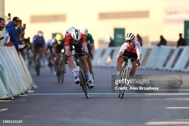 Stage winner Tim Merlier of Belgium and Team Soudal Quick-Step - Red Points Jersey and Bryan Coquard of France and Team Cofidis sprint at finish line...