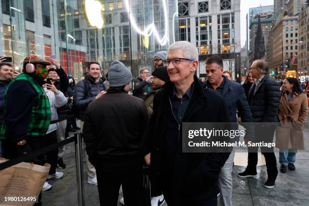 Apple CEO Tim Cook arrives as people stand in line to purchase the Apple Vision Pro headset at the Fifth Avenue Apple store on February 02, 2024 in...