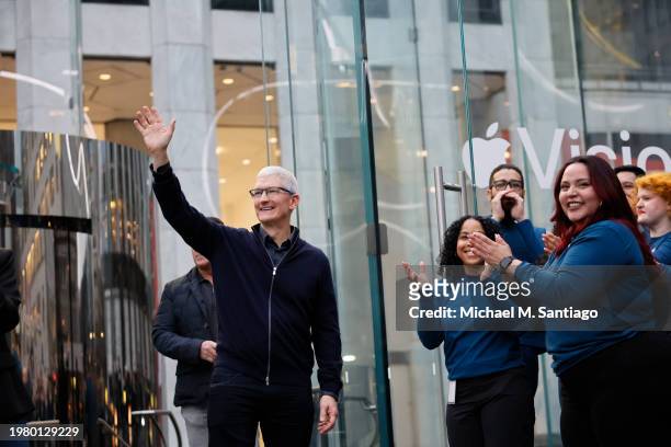 Apple CEO Tim Cook greets people as they prepare to open the Fifth Avenue Apple store on February 02, 2024 in New York City. Apple CEO Tim Cook and...