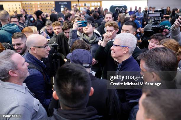 Apple CEO Tim Cook greets people at the release event of the Apple Vision Pro headset at the Fifth Avenue Apple store on February 02, 2024 in New...