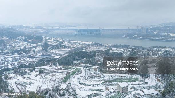 Snow is falling on the Three Gorges Reservoir area in Yichang, Hubei Province, China, on February 4, 2024.
