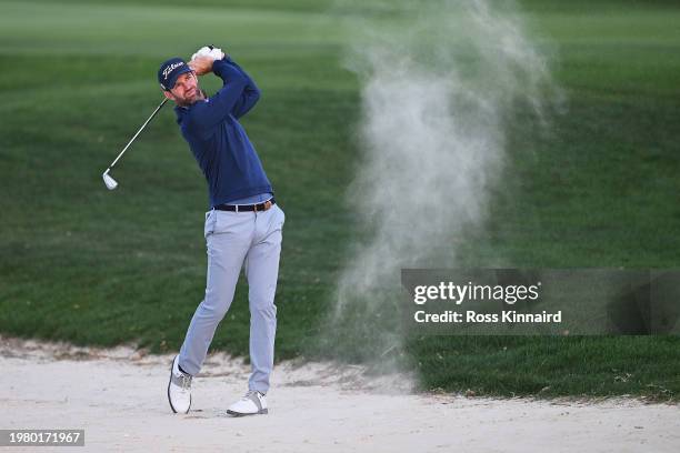 Scott Jamieson of Scotland plays his second shot on the ninth hole during Day Two of the Bahrain Championship presented by Bapco Energies at Royal...