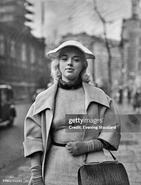 British actress and singer Diana Dors arriving at the High Court, at the Royal Courts of Justice on the Strand, Westminster, London, England, 21st...