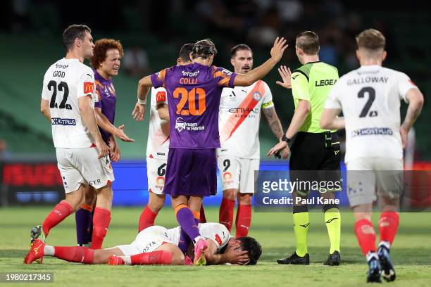 Tolgay Arslan of Melbourne City reacts on the ground after being fouled by Mustafa Amini of the Glory during the A-League Men round 15 match between...
