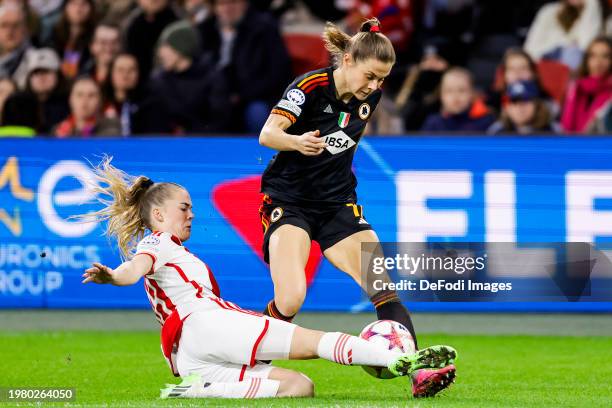 Milicia Keijzer of AFC Ajax and Emilie Haavi of AS Roma battle for the ball during the UEFA Women's Champions League group stage match between AFC...