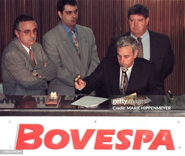 Transaction director at the Sao Paulo stock exchange Antonio Roberto da Costa closes the auction for the control of CPFL one of Brazil's main...