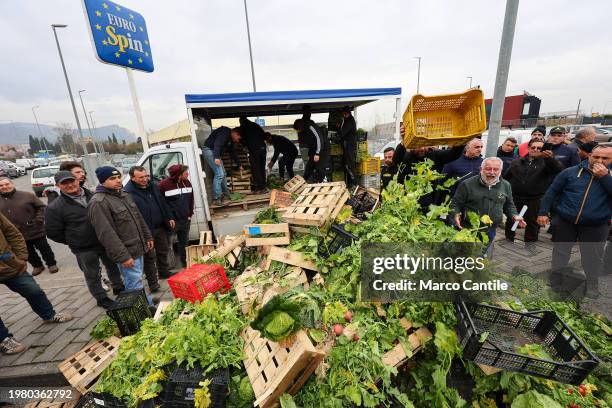 Farmers throw away their products, fruits and vegetables, during the demonstration to protest against the "Green Deal" initiatives, approved by the...