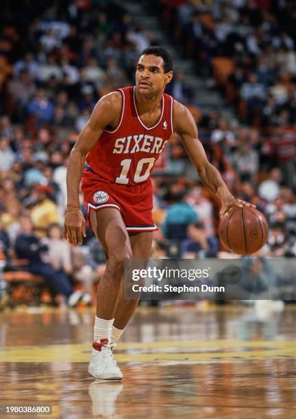 Maurice Cheeks, Point Guard for the Philadelphia 76ers dribbles the basketball down court during the NBA Pacific Division basketball game against the...