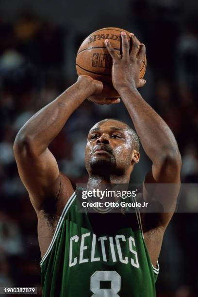 Antoine Walker, Power Forward for the Boston Celtics prepares to take a free throw shot during the NBA Pacific Division basketball game against the...