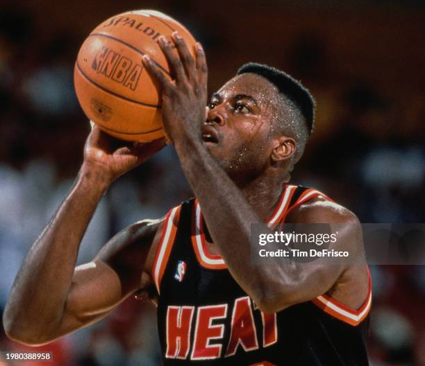 Glen Rice, Small Forward for the Miami Heat prepares to make a free throw shot during the NBA Midwest Division basketball game against the Denver...