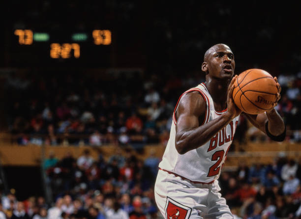 Michael Jordan, Shooting Guard and Small Forward for the Chicago Bulls prepares to make a free throw shot during the NBA Central Division basketball...