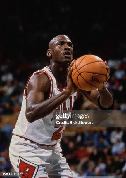 Michael Jordan, Shooting Guard and Small Forward for the Chicago Bulls prepares to make a free throw shot during the NBA Central Division basketball...