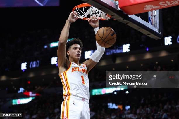 Jalen Johnson of the Atlanta Hawks dunks the ball against the Miami Heat during the second quarter of the game at Kaseya Center on January 19, 2024...