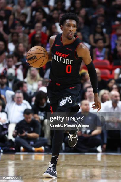 Josh Richardson of the Miami Heat dribbles the ball against the Atlanta Hawks during the fourth quarter at Kaseya Center on January 19, 2024 in...