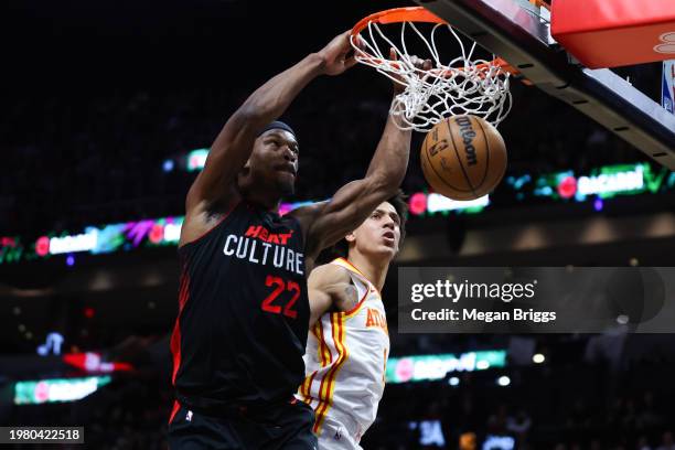 Jimmy Butler of the Miami Heat dunks the ball against the Atlanta Hawks during the fourth quarter at Kaseya Center on January 19, 2024 in Miami,...