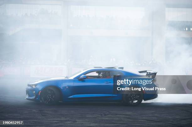 Chevrolette Camaro drifts during the MCM Show 2024 in Bogota, Colombia where automobile fans and collectors gather to appreciate Colombia's car...