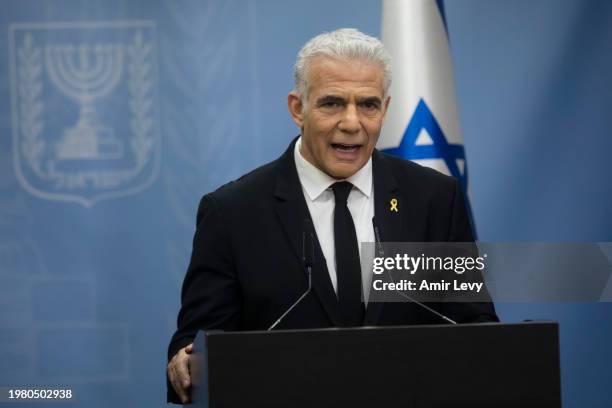 Israeli opposition and Yesh Atid party leader, Yair Lapid, speaks to the press during a party meeting on February 5, 2024 in Jerusalem. Leaders of...