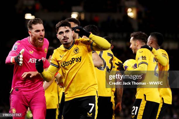 Pedro Neto of Wolverhampton Wanderers celebrates with teammates after scoring his team's third goal during the Premier League match between...