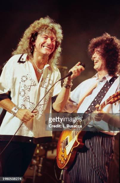 British songwriter and singer Robert Plant and British songwriter and guitarist Jimmy Page of the British rock band Led Zeppelin perform during the...