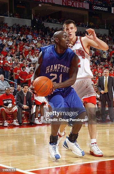 Mackel Purvis of the Hampton Pirates looks to pass against the Maryland Terrapins during the game at Comcast Center on January 8, 2003 in College...