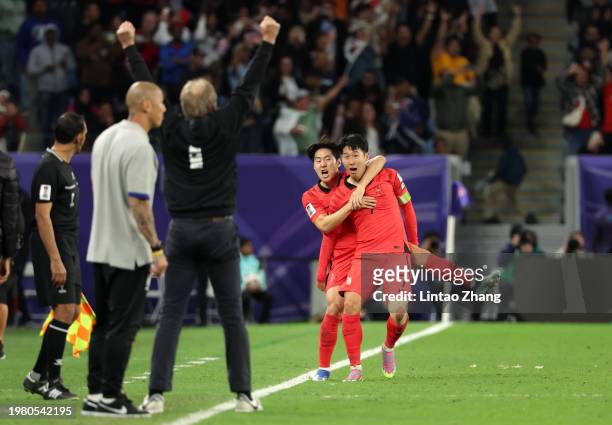 Son Heung-min of South Korea celebrates his goal with Lee Kang-in of South Korea during the AFC Asian Cup quarter final match between Australia and...