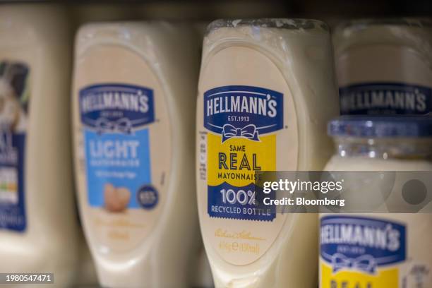 Bottles of Hellman's mayonnaise, manufactured by Unilever Plc, on display in a convenience store near Guildford, UK, on Monday, Feb. 5, 2024....