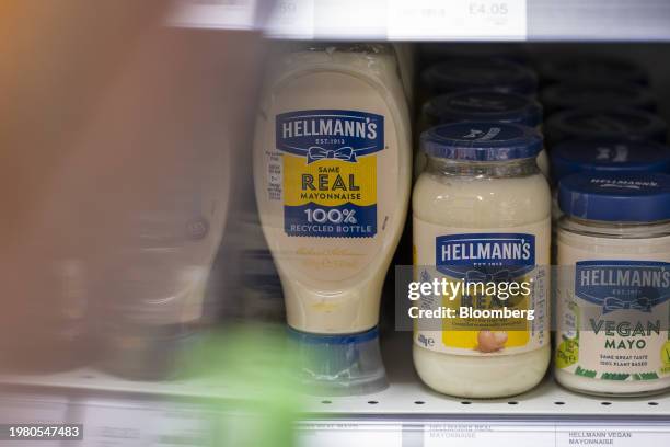 Bottles of Hellman's mayonnaise, manufactured by Unilever Plc, on display in a convenience store near Guildford, UK, on Monday, Feb. 5, 2024....