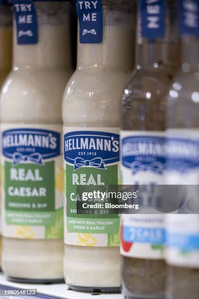 Bottles of Hellman's salad dressing, manufactured by Unilever Plc, on display in a convenience store near Guildford, UK, on Monday, Feb. 5, 2024....