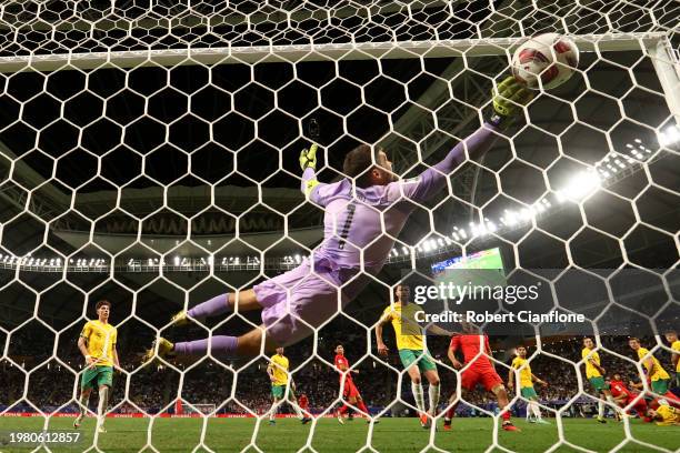 Son Heung-min of South Korea scores past Mathew Ryan of Australia in extra time during the AFC Asian Cup quarter final match between Australia and...