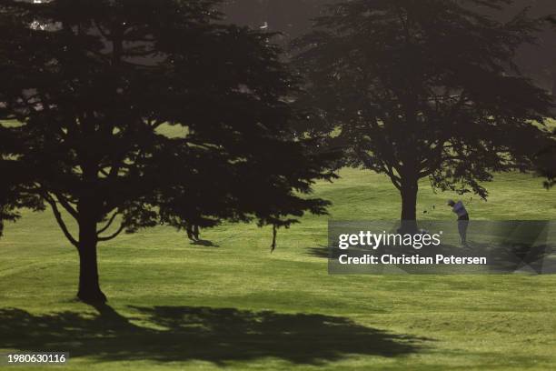 Patrick Rodgers of the United States plays a shot on the first hole during the second round of the AT&T Pebble Beach Pro-Am at Spyglass Hill Golf...